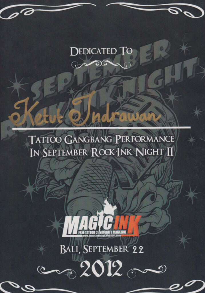 A prestigious award certificate displayed on a teakwood desk, with intricate carvings and a golden seal. It is presented to a tattoo artist of Hispanic descent in Bali, celebrating their innovative designs and dedication to maintaining the cultural integrity of traditional Balinese tattoo art.