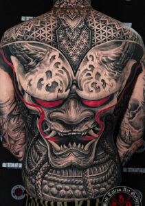 A snapshot highlighting a tattoo session in progress, with a focus on the blend of traditional Balinese elements and contemporary styles. This portfolio image showcases the evolving nature of tattoo art on the island.