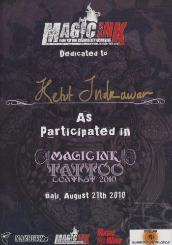 A beachside tattoo session in Bali, with a tattoo artist of Hispanic descent working on a client's leg tattoo under a thatched-roof hut. The scene shows a beautiful sunset, with the ocean in the background, symbolizing the island's serene beauty and the artistry of Balinese tattoo culture.