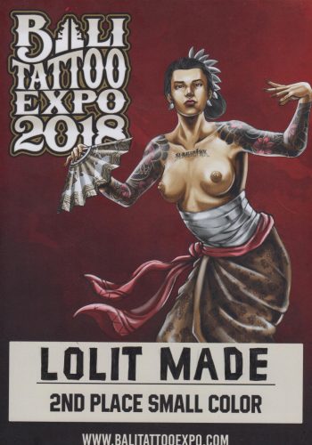 A bustling Bali street leads to a highly-rated tattoo studio, where an artist of Black descent is seen through the window, working on an intricate traditional Balinese sleeve tattoo. The studio is popular among locals and tourists alike, known for its skilled artists and welcoming atmosphere.